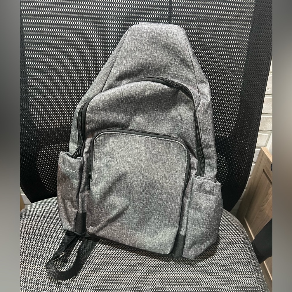 Thirty One Adjustable sling backpack in grey